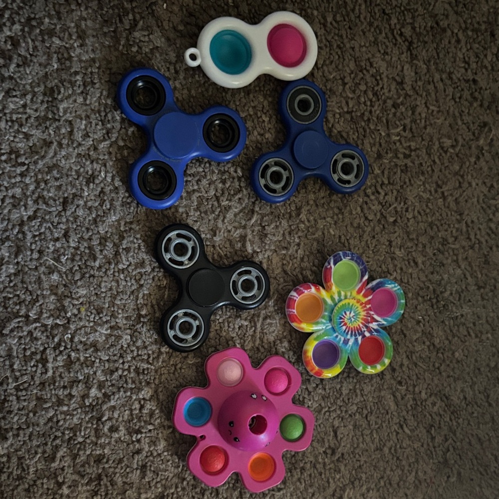 Vibrant Fidget Spinner and Pop Toy Collection